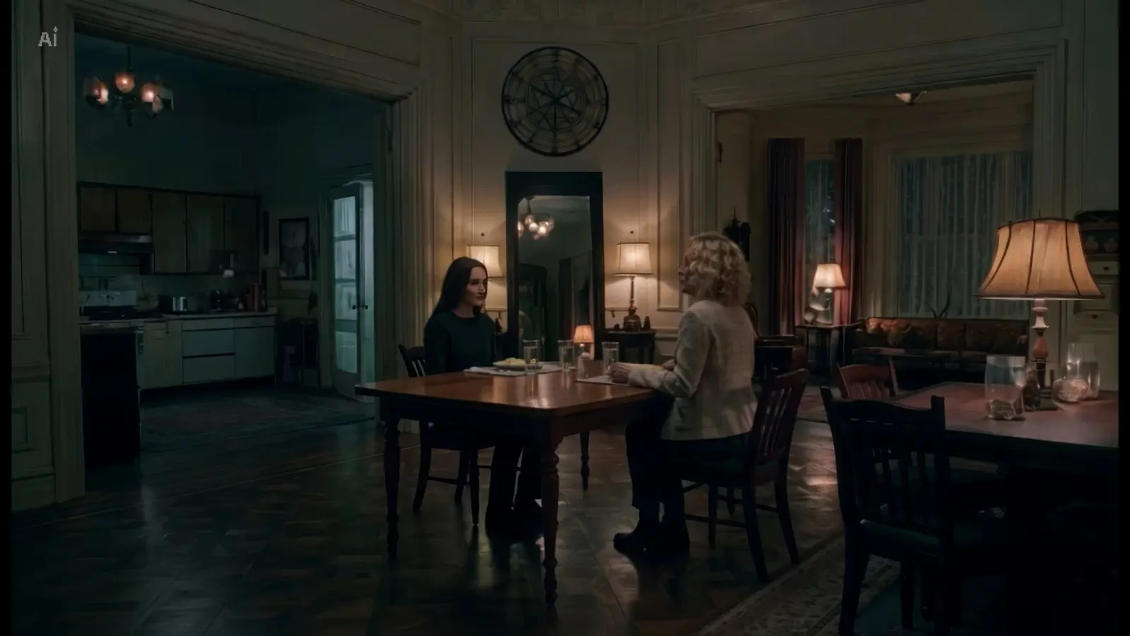 A girl and a woman at a dining table in a dim old house